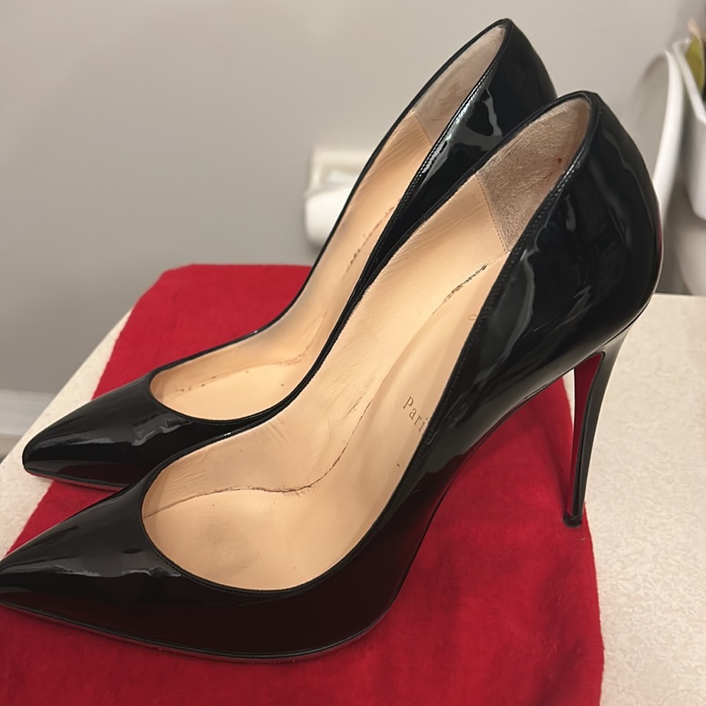 Christian Louboutin So Kate patent black leather heels